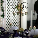 Our wrought iron tabletop candelabra with a simple arrangement of grapes.