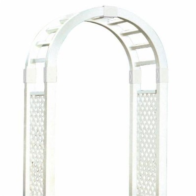 A white archway with lattice work along the vertical sides and a simple cross-frame across the arch.