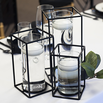 black cylinder cages